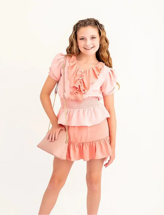 The Lord's Promise Blush and Coral Ruffle Button Accent Peplum Smocked Top and Coordinating Stretchy Metallic Waist Skort Evie's Closet Clothing