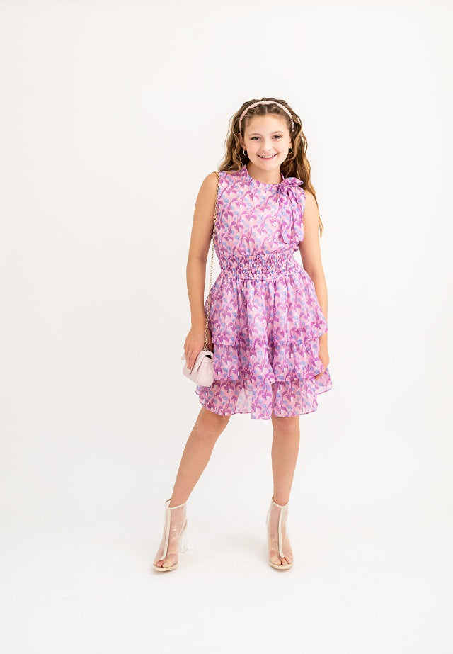 Consider the Lillies Lilac Printed Chiffon Bow Neck, Smocked Waist, Tiered Ruffle Dress