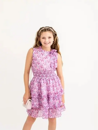 Consider the Lillies Lilac Printed Chiffon Bow Neck, Smocked Waist, Tiered Ruffle Dress Evie's Closet Clothing