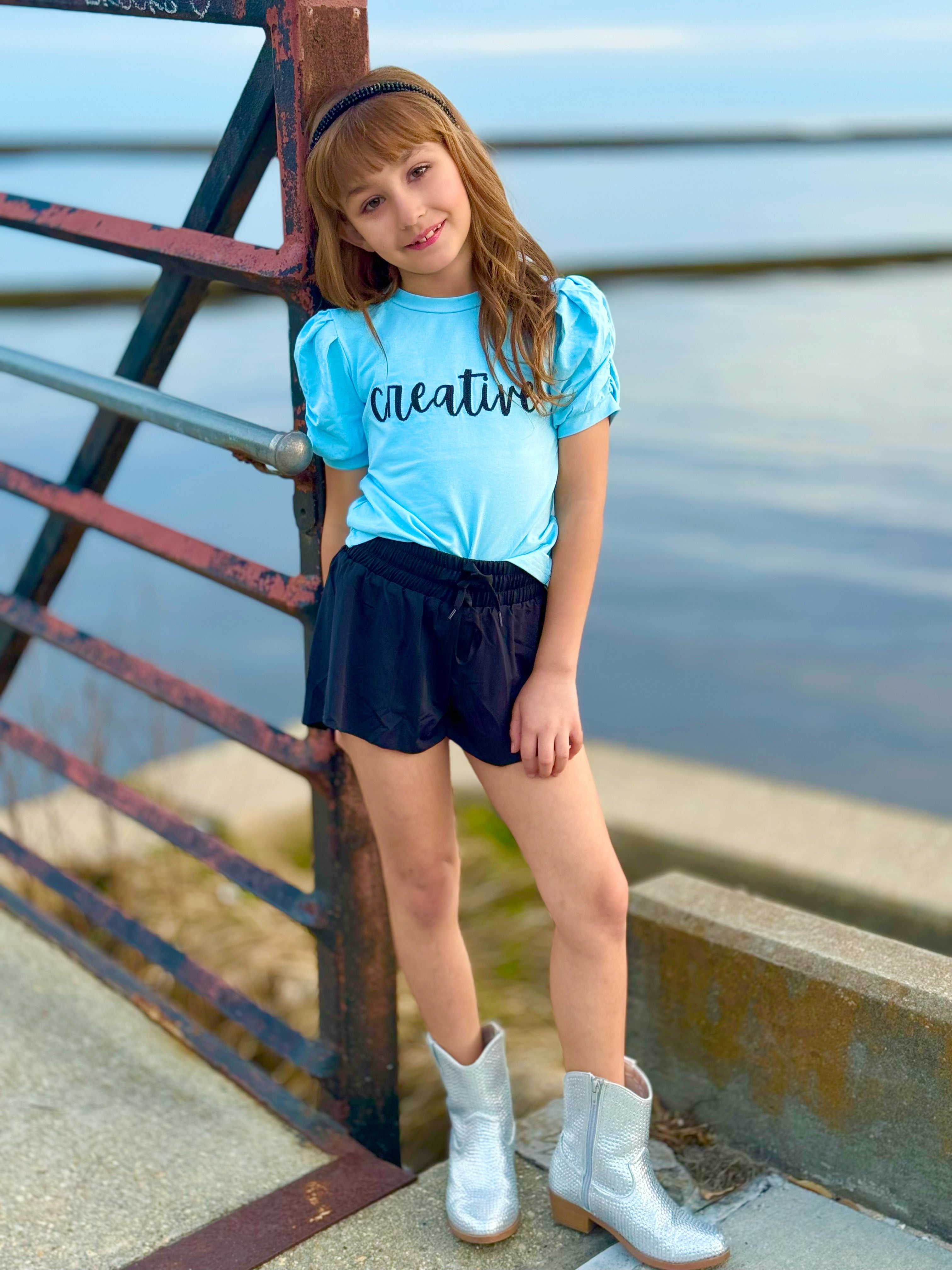 Affirmation: Creative, Baby Blue and Black Puff Sleeve Top and Fly Away Shorts