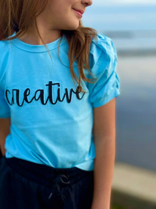 Affirmation: Creative, Baby Blue and Black Puff Sleeve Top and Fly Away Shorts - Evie's Closet Clothing