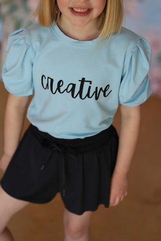 Affirmation: Creative, Baby Blue and Black Puff Sleeve Top and Fly Away Shorts - Evie's Closet Clothing