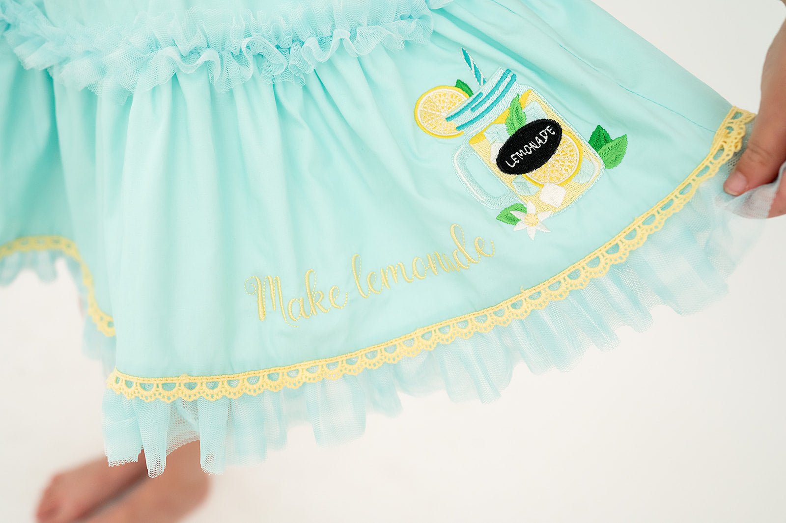 Make Lemonade Aqua and Lemon Yellow Embroidered Lace, Flutter Sleeve, and Tulle Accent Tunic Set - Evie's Closet Clothing
